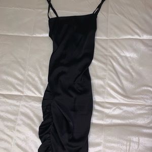 Tight, side cinched silk dress